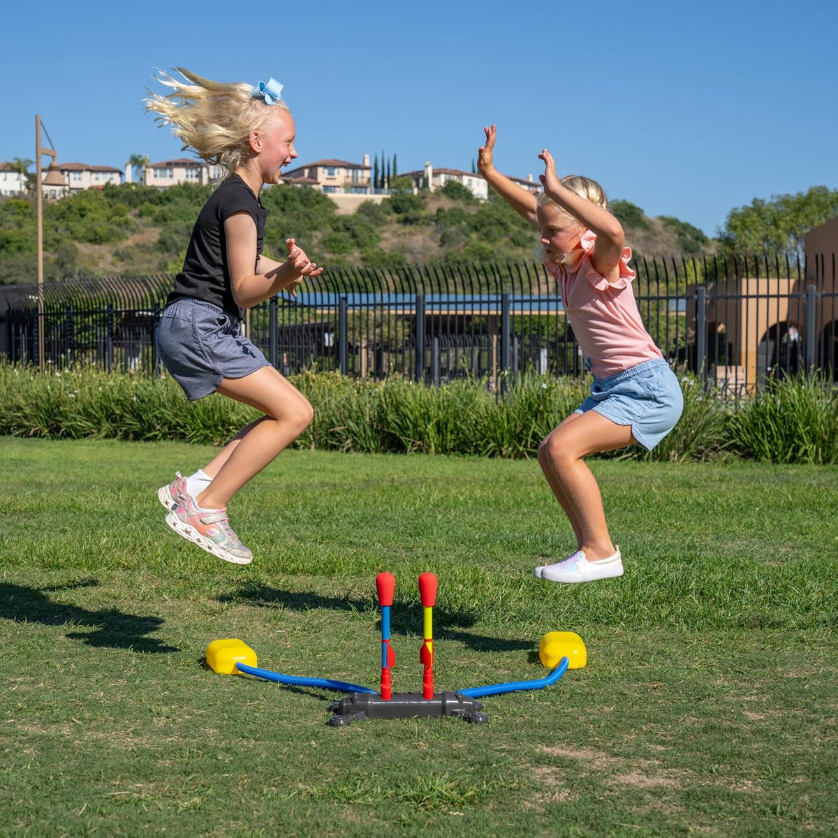 Stomp Rocket Original Dueling Rocket Launcher for Kids, 8 Rockets - Fun Backyard & Outdoor Kids Toys Gifts for Boys & Girls -Toy Foam Blaster Set Soars 200ft - Multi-Player Launcher Stand